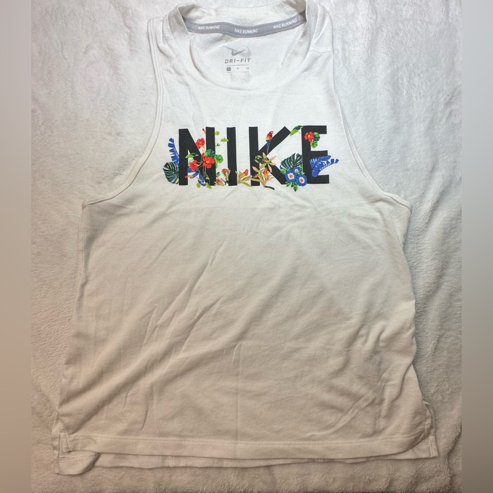 Nike Dri-Fit white tank top.